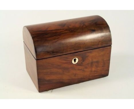 TEA CHEST.
A 19th century, domed walnut tea caddy with key. 18x13x11cm.