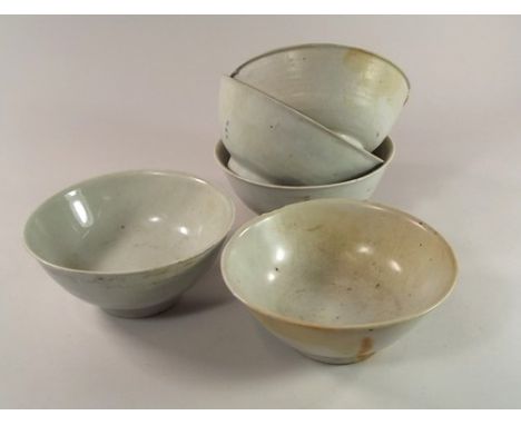 TEK SING CARGO.
Five Chinese Tek Sing cargo, porcelain bowls with slightly flared lip, each glazed very light turquoise, insi