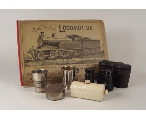 MISCELLANEOUS.
Christopher Volkert's 'Model of a Locomotive Steam Engine' book, a miniature stoneware hot water bottle etc.
