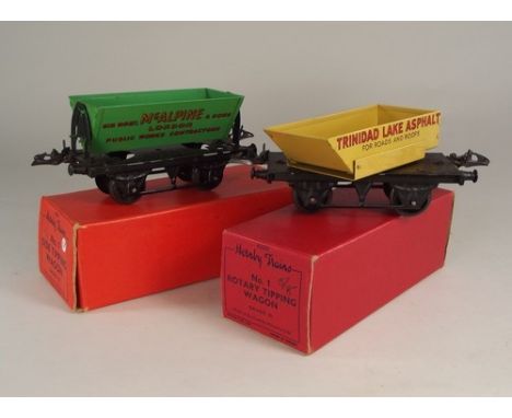 HORNBY O GAUGE.
A rotary tipping & a side tipping wagon. All with original boxes in good condition.