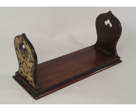 BOOK TROUGH.
A Victorian brass mounted extending book trough. Length unextended 34cm.