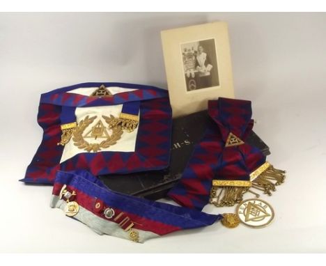 MASONIC REGALIA.
A metal case of Masonic regalia, including a collar with four jewels, two being silver gilt & enamelled. Sol