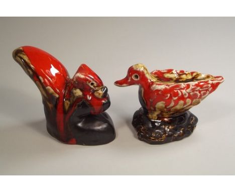 ERIC LEAPER.
Two models, a squirrel, height 9cm & a duck, length 10cm, by Eric Leaper. CONDITION REPORTS: The squirrel has br