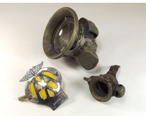 LUCAS LAMP ETC. 
A Lucas carbide lamp, one other lamp & an AA badge, 84022Y.