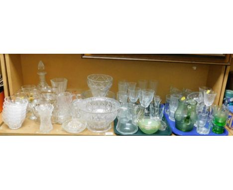 Various glassware, decanter, drinking glasses, moulded glass bowl, 22cm diameter, lemon squeezer, green glass jug, etc. (1 sh