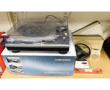 An Audio-Technica turntable, model number AT-LP120-USB, boxed, a turntable stylus full scale gauge tester, other accessories,