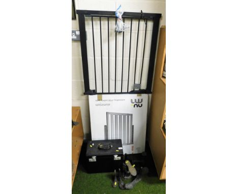 A cased Singer sewing machine, various metal shoe lasts and an aluminium extending child's safety gate, boxed. 