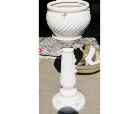 Ceramic jardiniere&nbsp;in white with small roses in relief to the bowl and to the support, 79cm high&nbsp;
