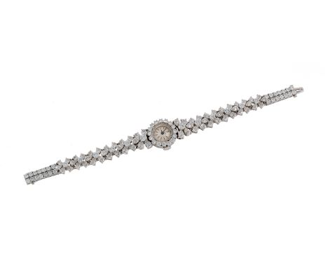 412 OROLOGIO PATEK PHILIPPE IN DIAMANTI, 1950 CIRCA cassa rotonda circondata di diamanti e bracciale in platino a scalare in 