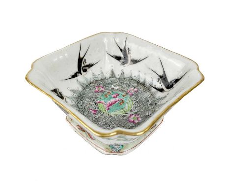 A Chinese famille rose porcelain footed square bowl, 19th century.  Decorated with floral sprays, birds and insects, red seal