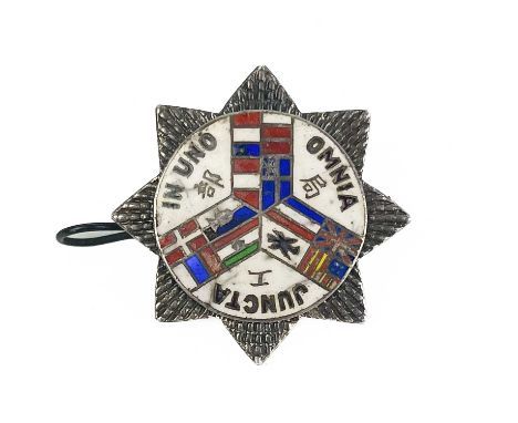 A Shanghai volunteer corps HQ staff officer collar badge.  The silver faceted star with central enamel medallion bearing the 