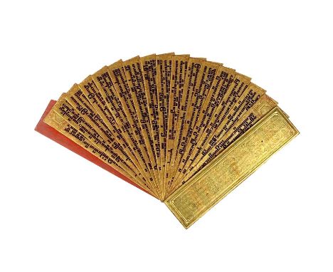 A Burmese Kammavaca manuscript, 19th century. With sixteen leaves and two red lacquer and gilded covers, 59 x 14.5cm, depth 5
