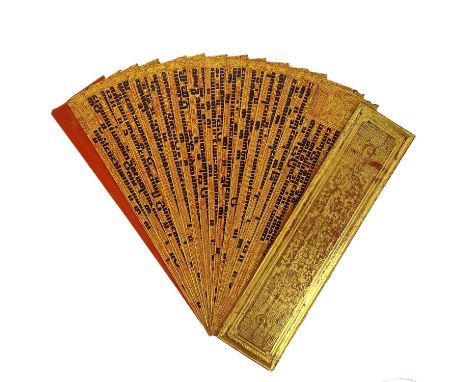 A Burmese Kammavaca manuscript, 19th century, With fourteen leaves and two red lacquer and gilded covers, 54 x 13cm, depth 3c