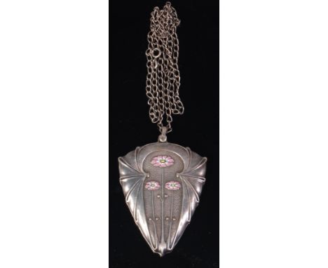 An Art Nouveau Secessionist double sided silvered metal mirror pendant locket, having hinged mechanism, with enamel floral st