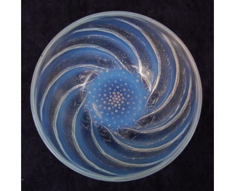 A René Lalique opalescent moulded glass Poissons bowl, the exterior decorated with swirling fish and central air bubbles, rai