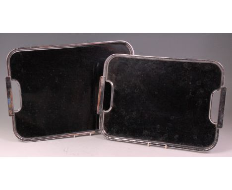 An Art Deco chrome and black lacquer inset twin handled serving tray, having rounded corners, remnants of paper label verso, 
