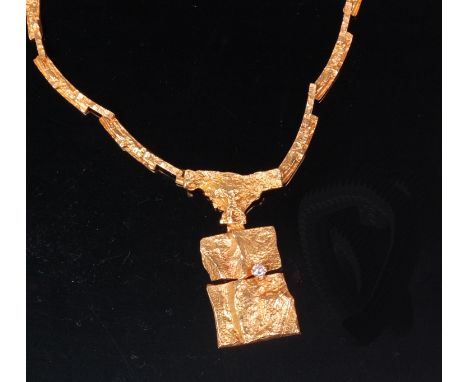 A Bjorn Weckstrom 1970s 18ct gold and diamond necklace, having textured T bar suspending irregular rectangular plaque claw se