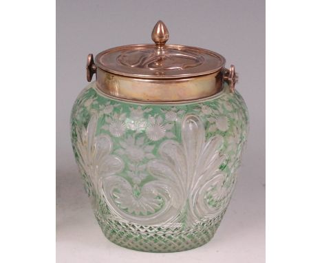 An Art Nouveau silver and overlay cut glass biscuit barrel and cover, having a floral and pierced stylised swing handle, the 