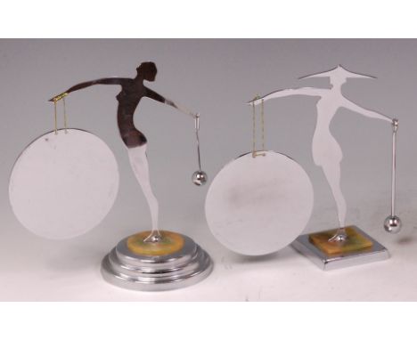 An Art Deco chrome flat-sided table gong, in the form of a female standing nude with integral suspended gong and removable be