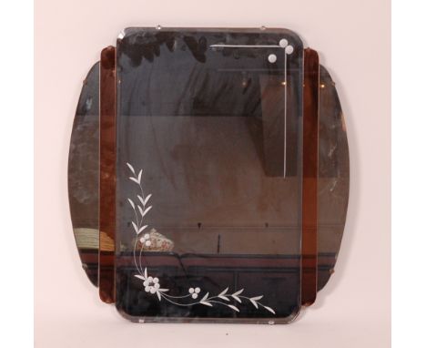 An Art Deco bevelled hanging wall mirror, of stepped shaped form with peach glass inset and engraved floral detail, 60 x 57cm
