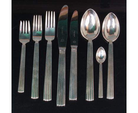 A Georg Jensen sterling silver single place setting cutlery suite, comprising; dinner fork, dessert fork, cheese fork, dinner