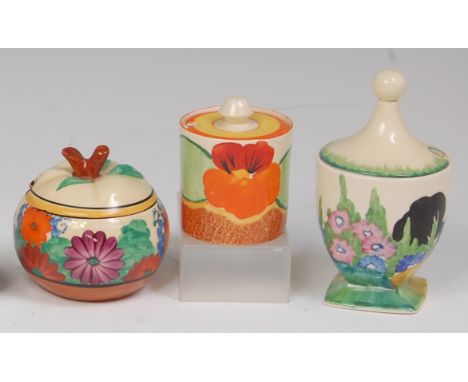 A 1930s Clarice Cliff A Gay Day pattern pottery honey pot and cover, in the form of an apple, printed backstamp verso, height