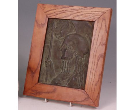 Gilbert William Bayes (1872-1953) - A green patinated relief work metal panel of a warrior and horses, housed in an oak frame
