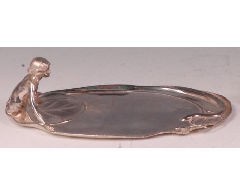 An Art Nouveau WMF silver plated calling card tray, of stylised oval form, with semi-nude female figure leaning over a lilipa