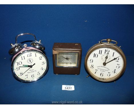 Two alarm clocks - Thos Russell &amp; Son and Towcaster Clockwork Co. together with a small German mache Bakelite bedside clo