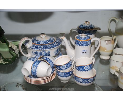 A Ho - Nan pattern blue and white coffee set including six cups and saucers, sugar bowl (chip around rim), coffee pot, milk/c