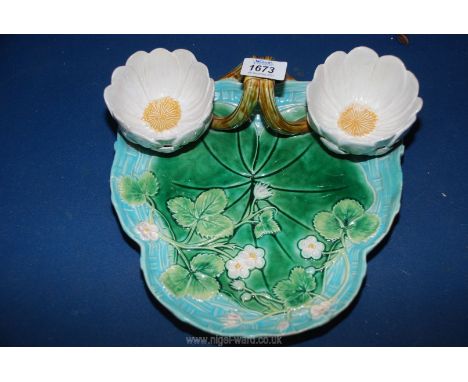 A George Jones style Majolica strawberry Dish decorated as a lily pond with lily cups, registration design mark to base, 10" 