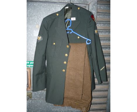 A dark green Army Jacket with brass buttons and insignia (37R), together with battle dress woollen khaki trousers (waist 32-3