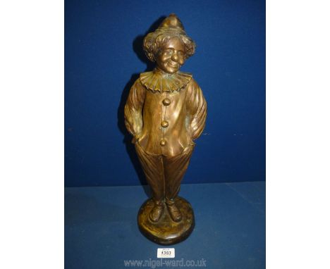 A well modelled bronze figure of a Clown standing on a circular plinth, 18'' high approx., weight 5500 gms approx. No obvious