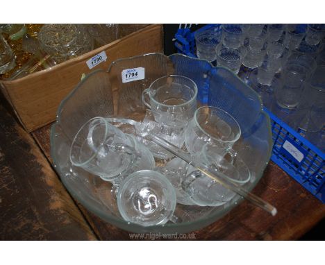 A Punch Bowl, cups and ladle.
