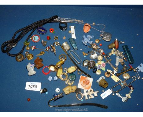 A small quantity of miscellanea including a miniature perfume bottle pendant, enamel pins, thimbles, buttons, etc., some a/f.