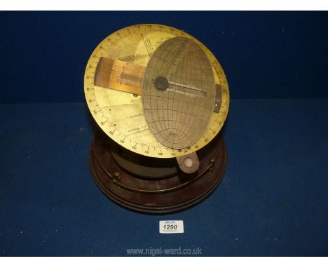 A brass and copper Cole pattern Sun Compass made between 1939 - 1945 in the  United Kingdom.
