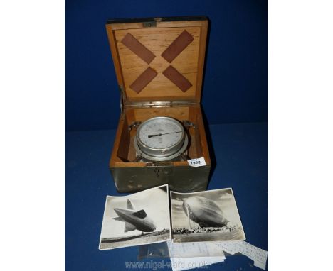 A Khaki colour painted wooden cased Altimeter/Barometer by ''R. Fuess Berlin-Steglitz'' having calibrations at to mm, milliba