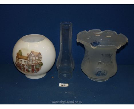 Two oil lamp shades : an etched clear fluted shade, the other white with Old Coach House, Woolhampton scene plus chimney.