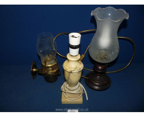 A brass ship's oil Lamp with gimbal, oil lamp converted to electric with etched glass shade and alabaster table lamp.