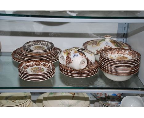 A Royal Worcester Palissy part dinner service in Game Birds pattern: nine bowls and saucers, six sweet dishes, four cups etc.