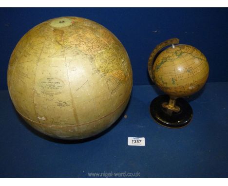 A Phillips 10" Challenge Globe (lacking stand) and a miniature globe on stand.