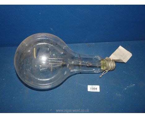 A very large light Bulb having Edison screw fitting, with label stating Eddystone Lighthouse, 12 3/4'' long.  