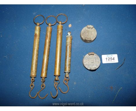 Vintage brass weighing scales, a Shell petrol can cap and BP petrol cap.