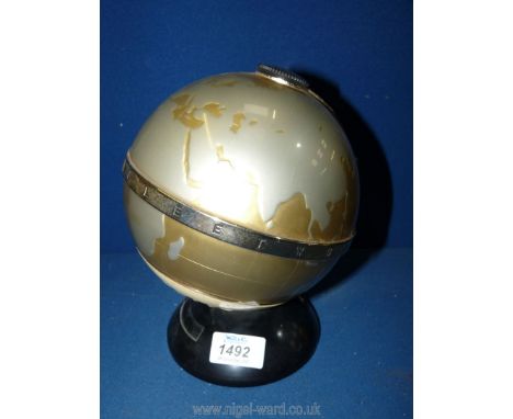 An unusual ''Fleetwood Transistor Six'' portable Radio in the form of a terrestrial globe, 8 1/4'' high (no aerial present).