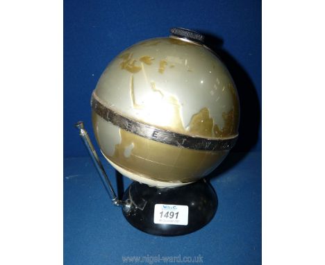 An unusual ''Fleetwood Transistor Six'' portable Radio in the form of a terrestrial globe, 8 1/4'' high, 23 3/4'' high to top