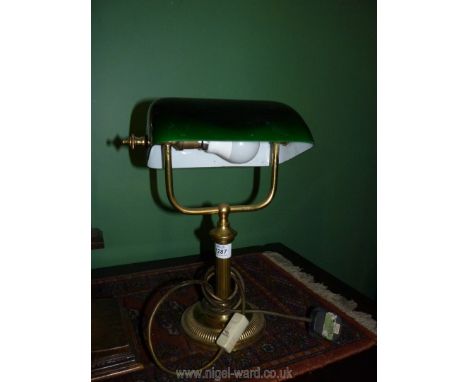 A brass Bankers light with green shade.