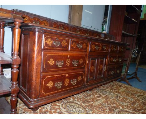A most elegant Mahogany veneer mirror backed sideboard by Ralph Johnson of Warrington, profusely decorated with marquetry dep