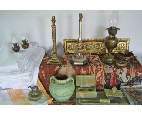 A miscellaneous collection to include several vintage white linen tablecloths, two similar polished onyx ashtrays with applie