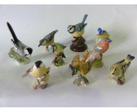 A collection of ceramic models of birds, Royal Worcester Goldcrest  3338, Marsh Tit 3336, Chaffinch 3240, Nuthatch 3334, a Be