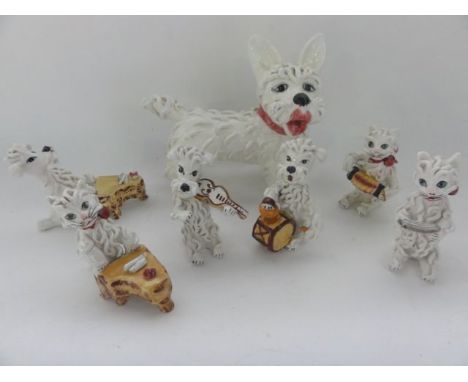 A collection of Italian ceramic figures of humorous cats and dogs including a Scottie Dog, cat and dog musicians,  with appli